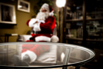 Santa claus in home and wooden desk of free space 