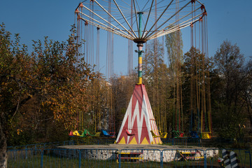 children's color carousel in summer park © Анна Приходько