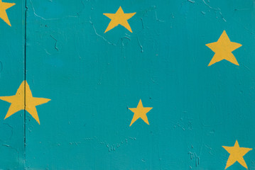 yellow stars on a blue wall
