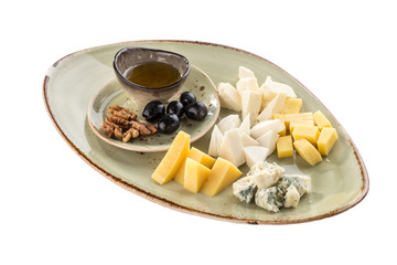 Many kinds of cheese with honey, walnut and olives isolated on white background