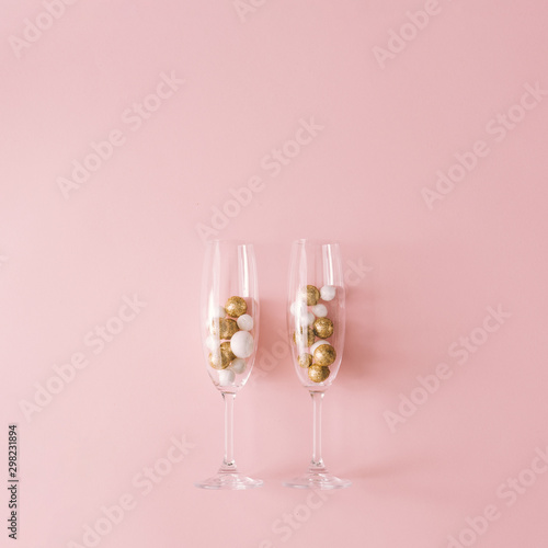 Champagne Glasses Filled With Golden And White Glitter Decoration