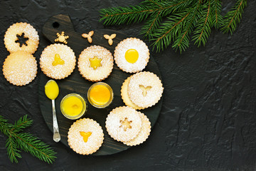 Christmas biscuits (linzer), with lemon and orange jam.