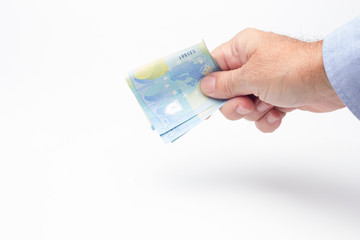 Dinero en la mano de una persona, billetes de euro, acción de pagar o de comprar algún objeto o...
