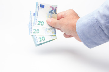 Dinero en la mano de una persona, billetes de euro, acción de pagar o de comprar algún objeto o...