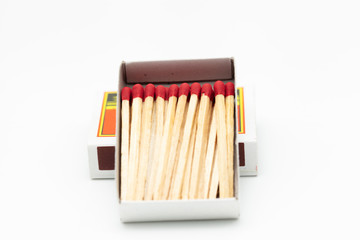 Obraz premium matchstick fire danger white isolated