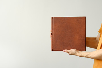 Mock up design templates. photo album in hand
