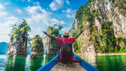 Panorama traveler man on boat joy fun amazed nature rock island adventure scenic landscape Khao Sok National park, Famous place tourist travel Thailand Tourism beautiful destination Asia vacation trip