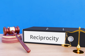 Reciprocity – Folder with labeling, gavel and libra – law, judgement, lawyer