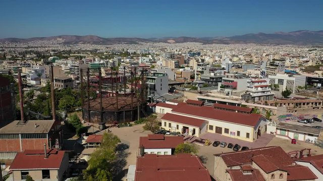 Aerial drone video of famous urban public area of Gazi and Kerameikos in the heart of Athens, Attica, Greece