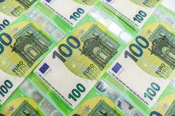 European paper money background. Hundreds euro banknotes. Lots of money business concept backdrop.