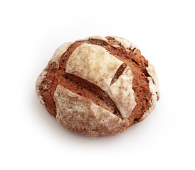 Freshly baked, handmade rural rye bread, isolated on white background.