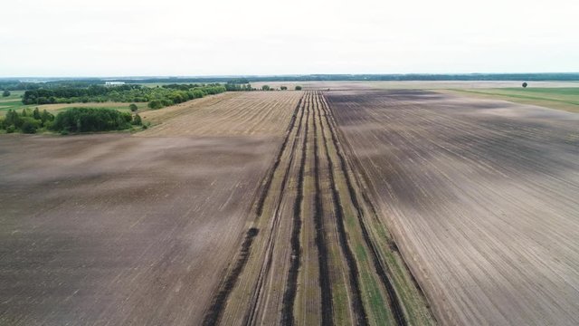 Smooth flight over a plowed field.