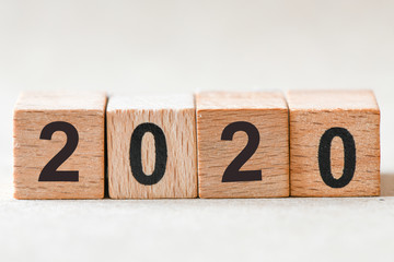 2020. Wooden cube block building the word 2020.