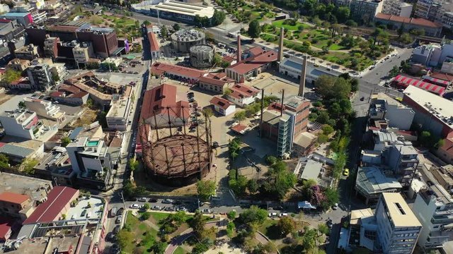 Aerial drone video of famous urban public area of Gazi and Kerameikos in the heart of Athens, Attica, Greece