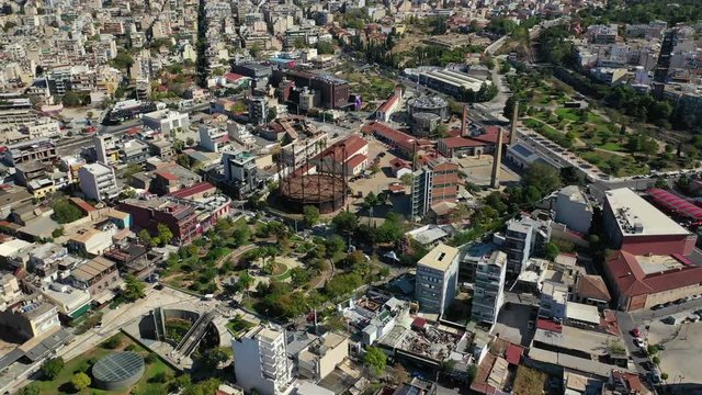 Aerial drone video of famous urban public area of Gazi and Kerameikos in the heart of Athens, Attica, Greece