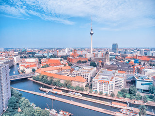 Fototapeta premium Berlin aerial view from drone, Germany. Buildings, tower and city river