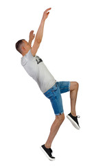 Side view of a man dancing in shorts.