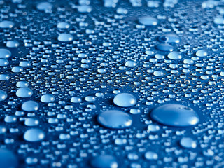 Water drops on blue background.