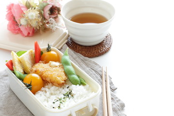 Japanese food, edamame soy bean and cutlet with tomato lunch box