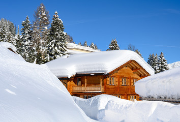 Wood chalet in  winter resort Davos - the home of annual  World Economy Forum.
