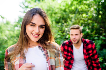 We are strong. family weekend. romantic date. first meet of couple outdoor. Relationship. girl in selective focus with man in park. couple in love. happy valentines day. summer camping in forest