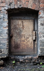 Old vintage door in an old brick building