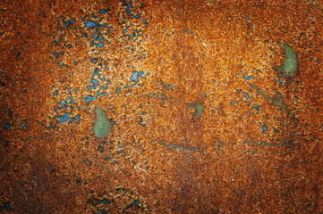 Fragment of an old rusty metal sheet