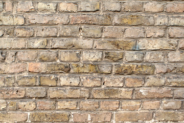 texture of an old light brick stone wall, background
