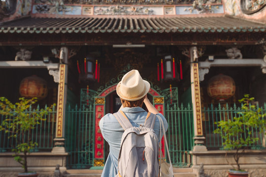 Traveler at Thien Hau Pagoda, dedicated to the Chinese sea goddess Mazu , in Cholon, the Chinatown area of Saigon