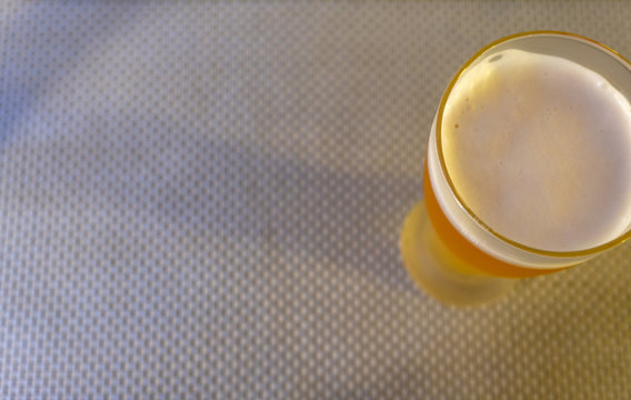 Glass Of Beer From Top On A Table