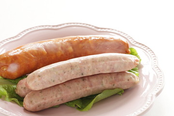 Prepared Germen sausage on dish with copy space