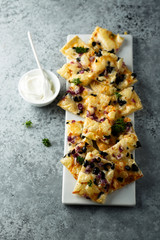 Homemade savory tart with onion and olives