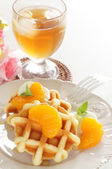 Canned mandarin orange and waffle for gourmet breakfast