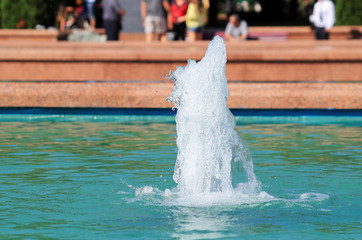 fountain in the city in summer
