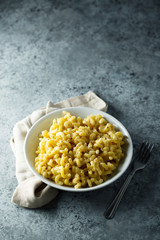 Homemade macaroni with cheese sauce