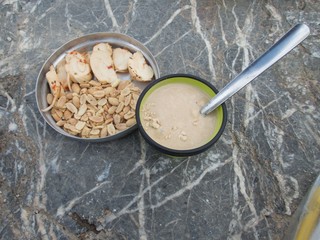 outdoor cooking camping breakfest with porridge