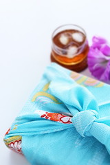 Japanese culture, furoshiki cloth wrapped gift for summer image