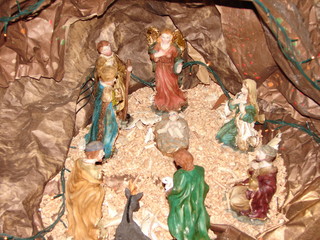 Christmas creche with Baby Jesus, Saint Joseph and Blessed Virgin Mary and the ox and the donkey