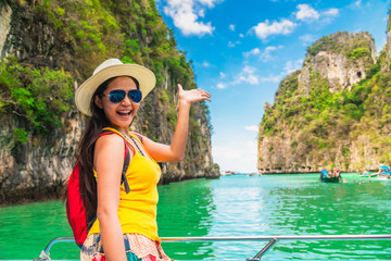 Happy traveler Asian woman on boat joy fun nature scenic landscape Pileh lagoon Krabi, Famous place...