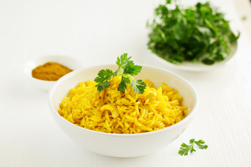 Vegetarian rice with curry and cashew nuts.