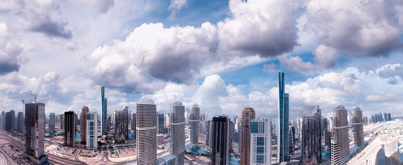 Fototapeta premium Dubai at sunset, UAE. Amazing aerial view from drone