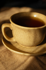 cup of hot tea in the morning on a sunny day