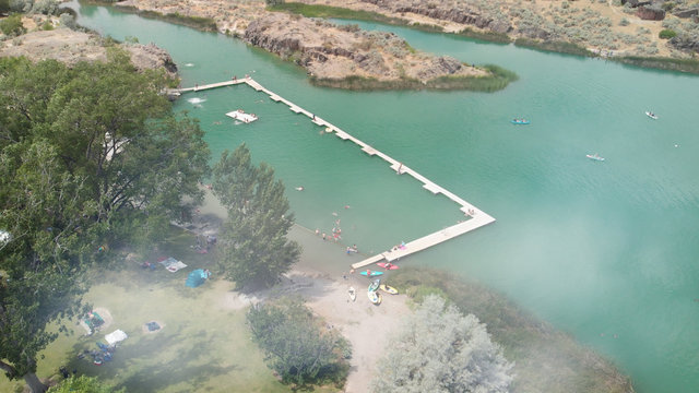 Aerial view of Dierkes Park Lake with tourists in summer on a beautiful sunny day, Twin Falls, Idaho