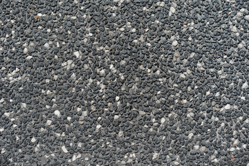 Dark rough concrete texture driveway background
