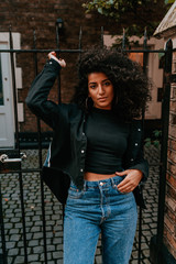 Portrait Charming Young African Woman with Curly Hair, Street Style