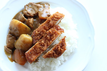 Japanese style curry, potato and pork curry rice with cutlet