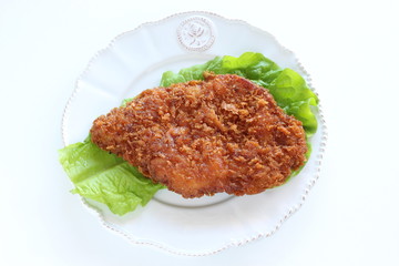 Japanese food, pork cutlet on lettuce with copy space
