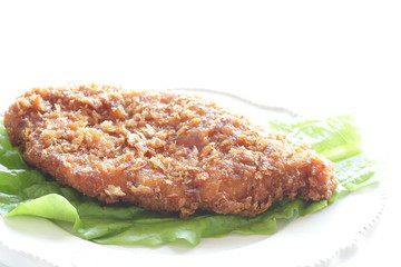 Japanese food, pork cutlet on lettuce with copy space