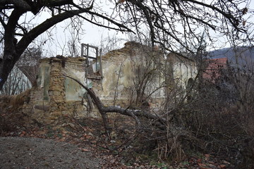 abandoned village with houses and church