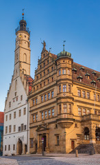 Fototapeta na wymiar Two Rathaus buildings at Marktplatz square Rothenburg ob der Tauber Old Town Bavaria Germany